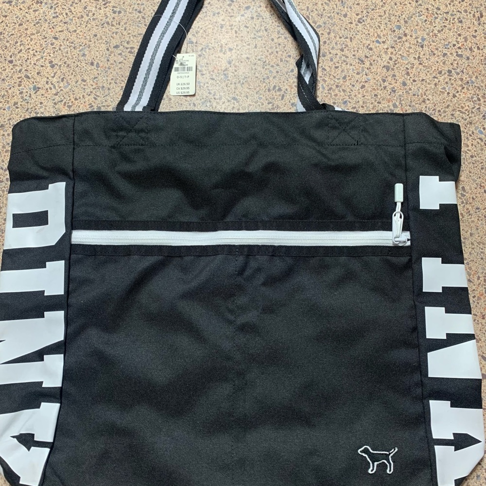 Victoria’s Secret pink black bag. New with tags. Smoke free home.